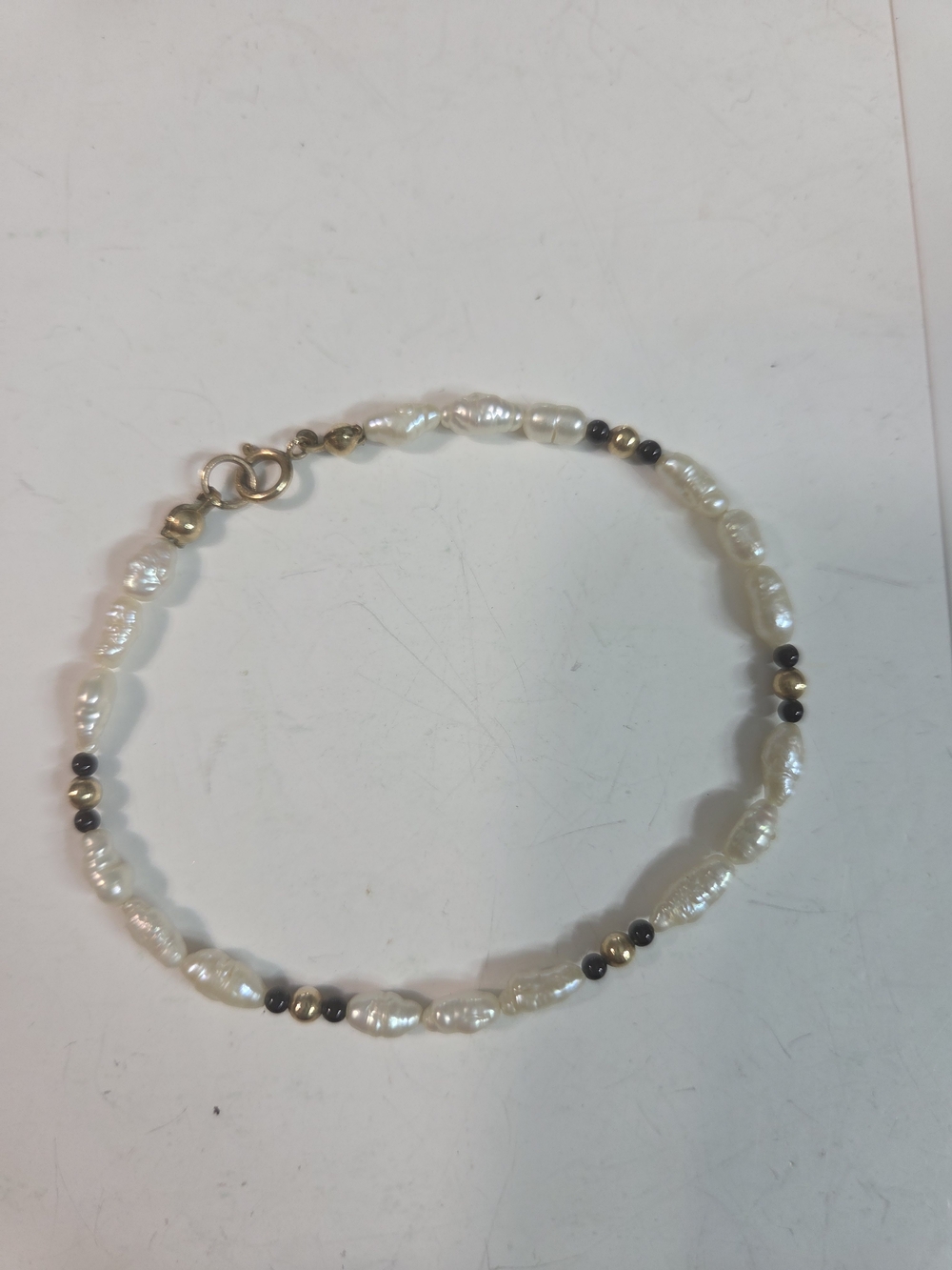 Delicate Freshwater rice Pearl Bracelet with Gold Accent Beads 14k gf clasp